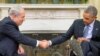 President Barack Obama (R) shakes hands with Israeli Prime Minister Benjamin Netanyahu in the Oval Office of the White House in Washington, Nov. 9, 2015.