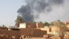 This picture taken in Aljazeera Eslang, north of Khartoum, shows smoke billowing in Omdurman, the capital's twin city, Sudan, July 3, 2023. 