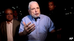 FILE - Panama's ex-President Ricardo Martinelli, shown talking to reporters in Panama City, Aug. 9, 2019, was sentenced to more than 10 years in prison July 18, 2023, for money laundering.