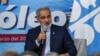FILE - Haitham Al Ghais, Secretary General of the Organization of the Petroleum Exporting Countries (OPEC), speaks during a news conference with Mexico's Secretary of Energy Rocio Nahle Garcia in Mexico City, Mexico March 9, 2023