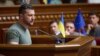 In this photo provided by the Ukrainian Presidential Press Office, Ukrainian President Volodymyr Zelenskyy addresses lawmakers during a Constitution Day session of the Ukrainian parliament in Kyiv, June 28, 2023. (Ukrainian Presidential Press Office via AP)