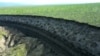 A view of the Batagaika crater, as permafrost thaws causing a mega-slump in the eroding landscape, in Russia's Sakha Republic in this image from video taken July 11 or 12, 2023. 