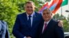 Bosnian Serb leader Milorad Dodik, left, poses with Hungarian Prime Minister Viktor Orban during a welcome ceremony in Banja Luka, Bosnia northwest of Sarajevo, June 22, 2023.