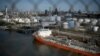 FILE - The Houston Ship Channel and adjacent refineries, part of the Port of Houston, are seen in Houston, May 5, 2019. A cargo of sanctioned Iranian crude oil that was confiscated by the United States has been sitting off the Texas coast for eight weeks as of July 25, 2023.