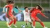 Vietnam's Thi Bich Thuy Nguyen is fouled by Portugal's Andreia Jacinto, right, during the Women's World Cup Group E soccer match between Portugal and Vietnam in Hamilton, New Zealand, July 27, 2023.