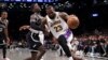 Tiền đạo LeBron James (áo số 23) của Los Angeles Lakers trong một pha đi bóng trước hậu vệ Dennis Schroder (17) của Brooklyn Nets tại Barclays Center. Ảnh: Vincent Carchietta-USA TODAY Sports 