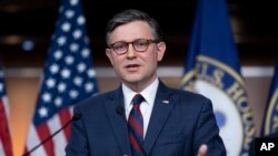 FILE - Speaker of the House Mike Johnson speaks during a news conference in Washington, May 7, 2024. On Tuesday, he vowed to press ahead with requiring proof of citizenship for new voters as part of a bill to avoid a partial government shutdown in three weeks.