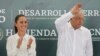 ARCHIVO - El presidente mexicano Andrés Manuel López Obrador y la presidenta electa, Claudia Sheinbaum, asisten a un evento con familias de los mineros que perdieron la vida en la mina de carbón Pasta de Conchos en febrero de 2006, en Nueva Rosita, México, el 14 de junio de 2024.