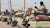 Après avoir exigé le départ de la Minusma, les militaires au pouvoir ont remporté une victoire de prestige en s'emparant en novembre de la ville de Kidal (nord), bastion des groupes séparatistes à dominante touareg désormais affaiblis. (Photo by STRINGER / AFP)