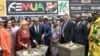 A'Salfo, leader vocal du groupe Magic System, et la Première dame de Côte d'Ivoire Dominique Ouattara à Abidjan, le 14 mai 2024.