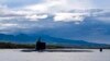 FILE - The submarine USS Missouri departs Joint Base Pearl Harbor-Hickam for a scheduled deployment, Sept. 1, 2021. (U.S. Navy via AP)