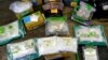 FILE - Plastic bags of fentanyl are displayed on a table at the U.S. Customs and Border Protection area at the International Mail Facility at O'Hare International Airport in Chicago, Nov. 29, 2017.