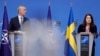 Sweden's Foreign Minister Ann Linde, right, speaks at a media conference with NATO Secretary General Jens Stoltenberg at NATO headquarters in Brussels, Jan. 24, 2022. 