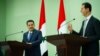 Syria's President Bashar al-Assad and Iraqi Prime Minister Mohammed Shia Al-Sudani attend a news conference, in Damascus, Syria July 16, 2023. (Iraqi Prime Minister's Media Office/Handout via Reuters) 