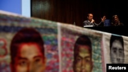 Carlos Martin Beristain and Angela Buitrago, members of the Interdisciplinary Group of Independent Experts, attend the press conference about the 43 missing students of the Ayotzinapa Teacher Training College, in Mexico City, Mexico, July 25, 2023.