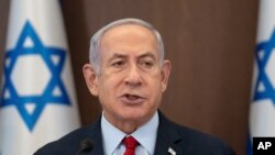 Israeli Prime Minister Benjamin Netanyahu chairs a cabinet meeting at the Prime Minister's Office in Jerusalem, June 18, 2023.