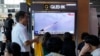 FILE - A TV screen shows a file image of a North Korean missile launch during a news program at the Seoul Railway Station in Seoul, South Korea, July 22, 2023.