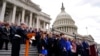 Anggota keluarga mendiang Petugas Polisi Capitol AS yang tewas dalam serangan di Gedung Capitol tahun 2021, ikut hadir dalam upacara yang menandai peringatan kedua di Washington DC, 6 Januari 2023.