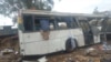 died and scores were injured when two buses collided. 