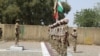 Babban hafsan sojojin kasa na Najeriya, Janar Tukur Buratai, yana duba fareti a lokacin kaddamar da baburan da sojoji zasu rika shiga daji da su wajen yakar 'yan Boko Haram