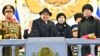 Pemimpin Korea Utara Kim Jong Un, kiri tengah, dan putrinya menghadiri parade militer untuk memperingati 75 tahun berdirinya Tentara Rakyat Korea di Pyongyang, Korea Utara, 8 Februari 2023. (Foto: KCNA via AP)