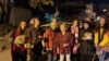 A screenshot from a video posted on the Twitter page of Iranian photographer Alieh Motalebzadeh shows the prisoners whose release from Tehran's Evin prison was announced on Feb. 9, 2023. 