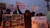 Members of the Hazara community and various non-governmental organizations sit-in during a protest against the twin bomb attack in Quetta, in Lahore, Pakistan, January 12, 2013. 