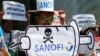 Protesters rally at the Sanofi Pasteur office in suburban Taguig city to protest the drug company's deal with the government for the anti-dengue vaccine Dengvaxia, March 5, 2018, east of Manila, Philippines. The vaccine was administered to more than 830,000 school children and adults before being pulled from the shelves after new study showed it posed risks of severe cases in people without previous infection.