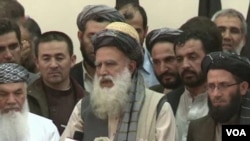 Abdul Rab Rasoul Sayyaf, an influential lawmaker and religious scholar, addresses supporters on Thursday, Oct. 3, 2013.