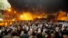 Pakistani protesters run during clashes near prime minister's home in Islamabad, Aug. 30, 3014.
