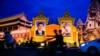 FILE: A decoration of a portrait of Chinese president Xi Jinping, chief of Community Party ( L) and a portrait of Cambodian king Norodom Sihamoni ( R) to welcome president Xi to Cambodia on the corner of Sotharos Blvd and Sihanouk Blvd in Phnom Penh on Thursday, October 13, 2016. (Leng Len/VOA Khmer)
