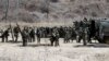 South Korean soldiers prepare for their military exercise in the border city between two Koreas, Paju, north of Seoul, South Korea, Friday, March 29, 2013.