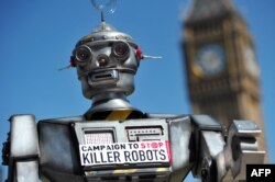 FILE - The mock killer robot was displayed in London in April 2013 during the launching of the Campaign to Stop Killer Robots, which calls for the ban of lethal robot weapons that would be able to select and attack targets without any human intervention.