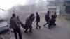 This frame grab from video released by the Syrian Civil Defense White Helmets, which has been authenticated based on its contents and other AP reporting, shows members of the Syrian Civil Defense group and civilians carrying victims after airstrikes hit in Ghouta, a suburb of Damascus, Syria, Thursday, March. 1, 2018. 