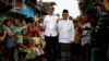 Presiden Joko Widodo dan Ma'ruf Amin setelah mendeklarasikan kemenangan pilpres 2019 di Jakarta, Selasa, 21 Mei 2019. (Foto: Reuters)