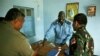United Nation's military observers greet the Director of Police, Brig. Gen. William Chulo, in Renk, southern Sudan, 15 Sep 2010