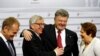 Президент України обміймається із президентом Європейської комісії Юнкером