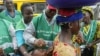 Community leaders, health workers, Muslim clerics, and victims work to vaccinate Nigerians against polio.