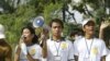 Social activists carry an anti-corruption banner during a rally in Phnom Penh.