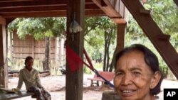 Im Chaem, a former Khmer Rouge commander, holds her grandson at her home in Anlong Veng district, in Cambodia's Oddar Meanchey province, where she is a first deputy commune chief. The 65-year-old former commander told VOA Khmer in an exclusive interview i
