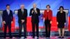 From left, Democratic presidential candidates Pete Buttigieg, Sen. Bernie Sanders, Joe Biden, Elizabeth Warren, and Amy Klobuchar, are seen ahead of their primary debate at Saint Anselm College in Manchester, New Hampshire, Feb. 7, 2020. 