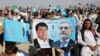 Supporters of Afghan presidential candidate Abdullah Abdullah attend a campaign rally in the Paghman district of Kabul, Afghanistan, June 9, 2014.