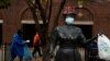 US States Tighten Coronavirus Restrictions After Rise in Cases 