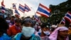 Anti-government protesters gather during clashes with police at metropolitan police headquarters in Bangkok Dec. 2, 2013.