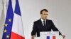French President Emmanuel Macron gives a speech in the northern port of Calais on Jan. 16, 2018, vowing that France will not allow another migrant camp like the infamous "Jungle" to spring up in the city.