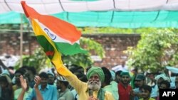 ভারতের মুজাফ্ফরগড়ে কেন্দ্রীয় কৃষি সংস্কার আইনের বিরোধিতা করে বিভিন্ন কৃষক ইউনিয়নের সমাবেশ, ফাইল ছবি, ৫ই সেপ্টেম্বর, ২০২১, ছবি, মনি শর্মা- এএফপি 