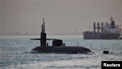 The guided-missile submarine USS Florida (SSGN 728) transits the Suez Canal in Egypt, en route the Middle East in support of the Bahrain-based U.S. Fifth Fleet
