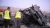 Pakistani volunteers search for blast victims in the wreckage of a destroyed passenger bus following a bomb explosion in Mastung district, about 25 kilometres south of Quetta, the capital of insurgency-hit Baluchistan province, September 18, 2012. 
