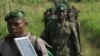 Des militaires des Forces armées de la RDC sur le front contre les miliciens Mai Mai dans le Parc de Virunga, Nord-Kivu, juin 2017 (VOA/Charly kasereka)