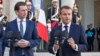Austrian Chancellor Sebastian Kurz, left, and French President Emmanuel Macron make declarations prior to their meeting at the Elysee Palace in Paris, Sept. 17, 2018. 